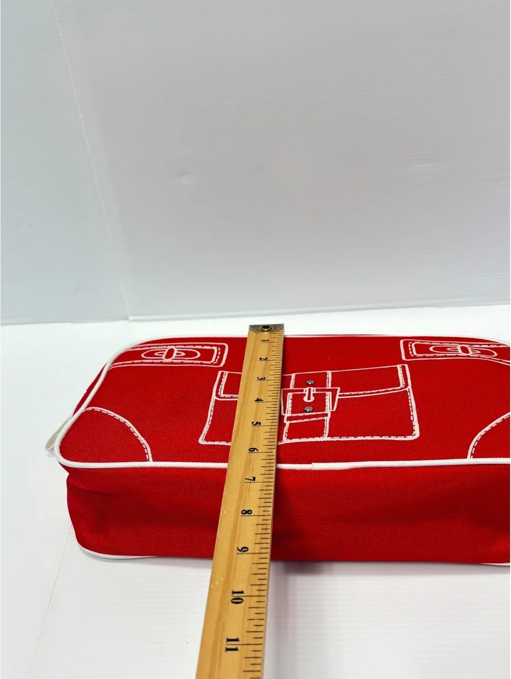Clinique Red Canvas Cosmetic Bag with White Image Stitching and Zipper Closure